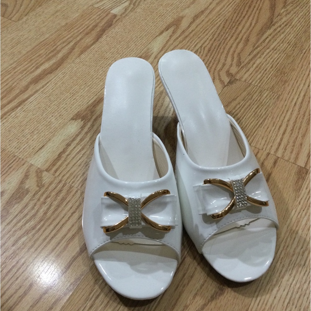 White slipper with heel